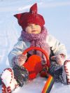 Child playing in the snow